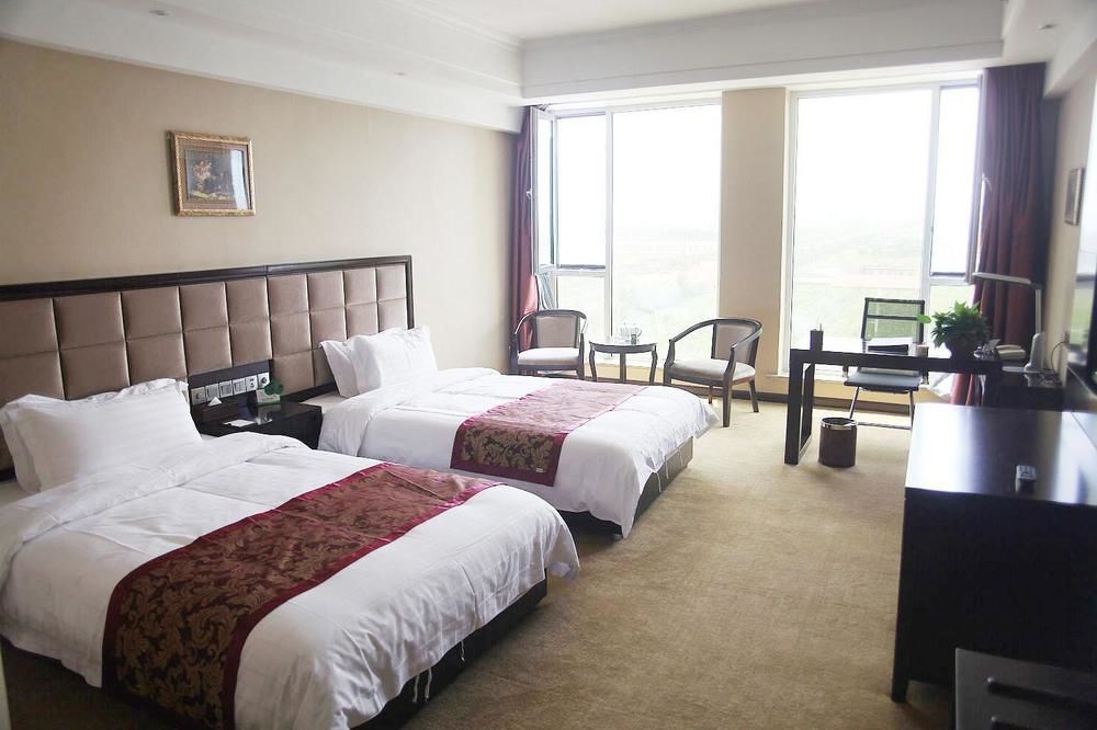 Weishi International Hotel Qing Zhou Buitenkant foto