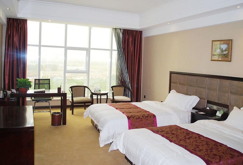 Weishi International Hotel Qing Zhou Buitenkant foto