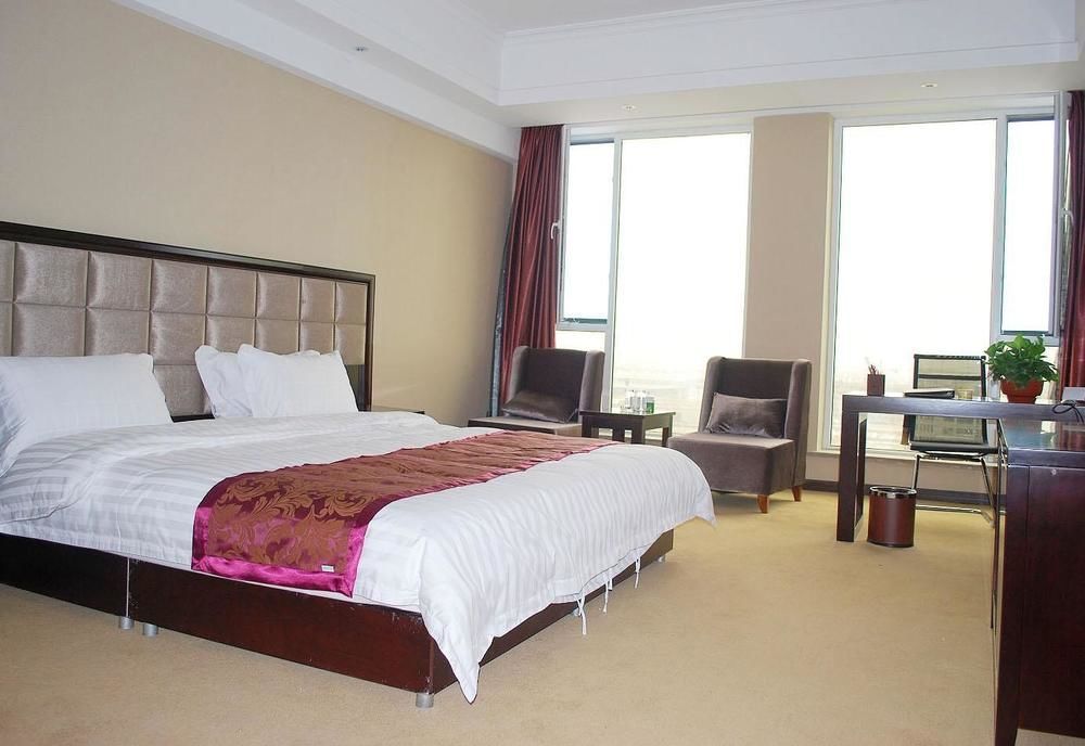 Weishi International Hotel Qing Zhou Buitenkant foto