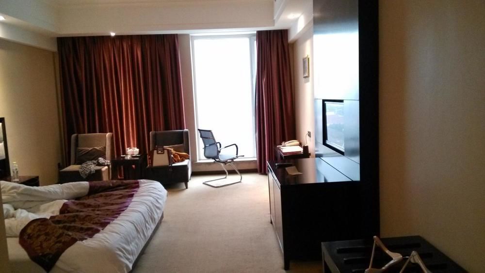 Weishi International Hotel Qing Zhou Buitenkant foto