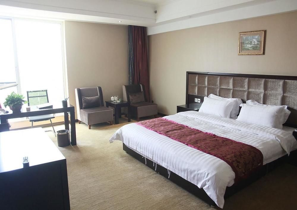 Weishi International Hotel Qing Zhou Buitenkant foto