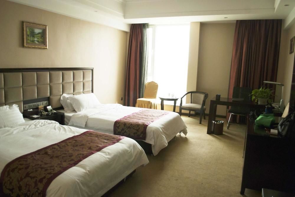 Weishi International Hotel Qing Zhou Buitenkant foto