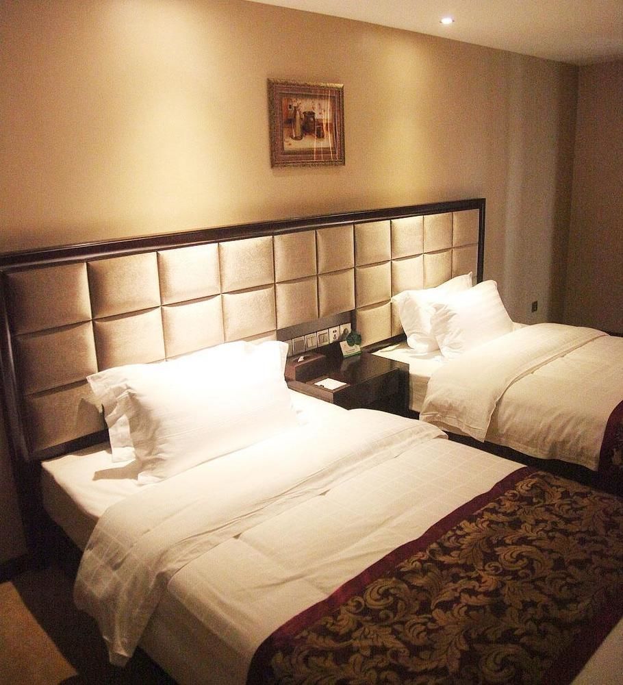 Weishi International Hotel Qing Zhou Buitenkant foto