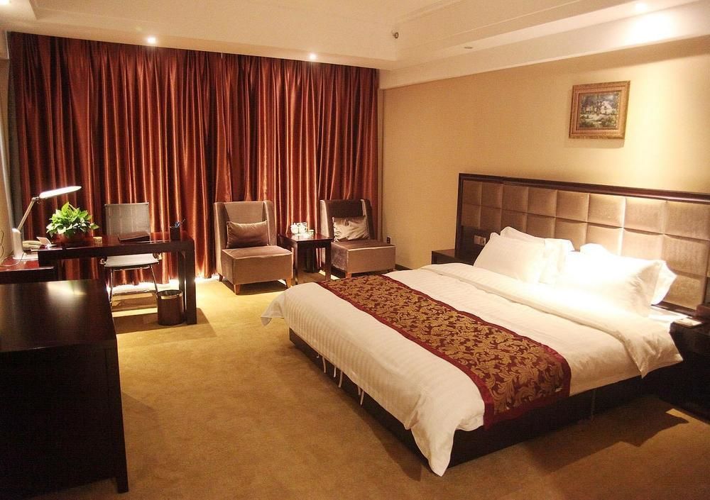 Weishi International Hotel Qing Zhou Buitenkant foto